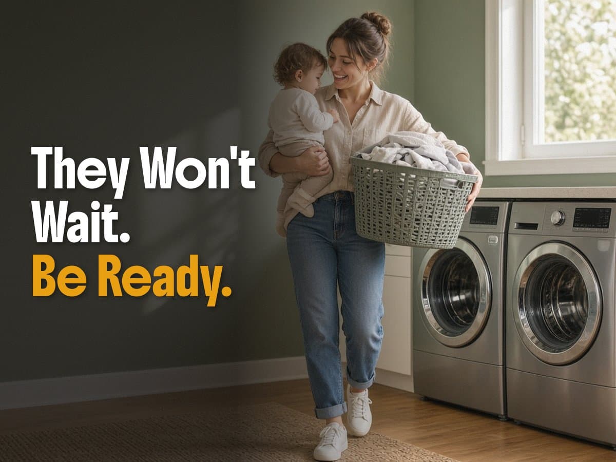 A smiling woman carries a baby and a laundry basket past two washers, beside the words They Won't Wait. Be Ready.